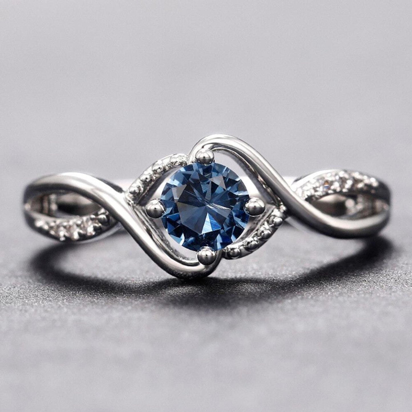 Light blue round twist RING - Silver - CZs - size 6