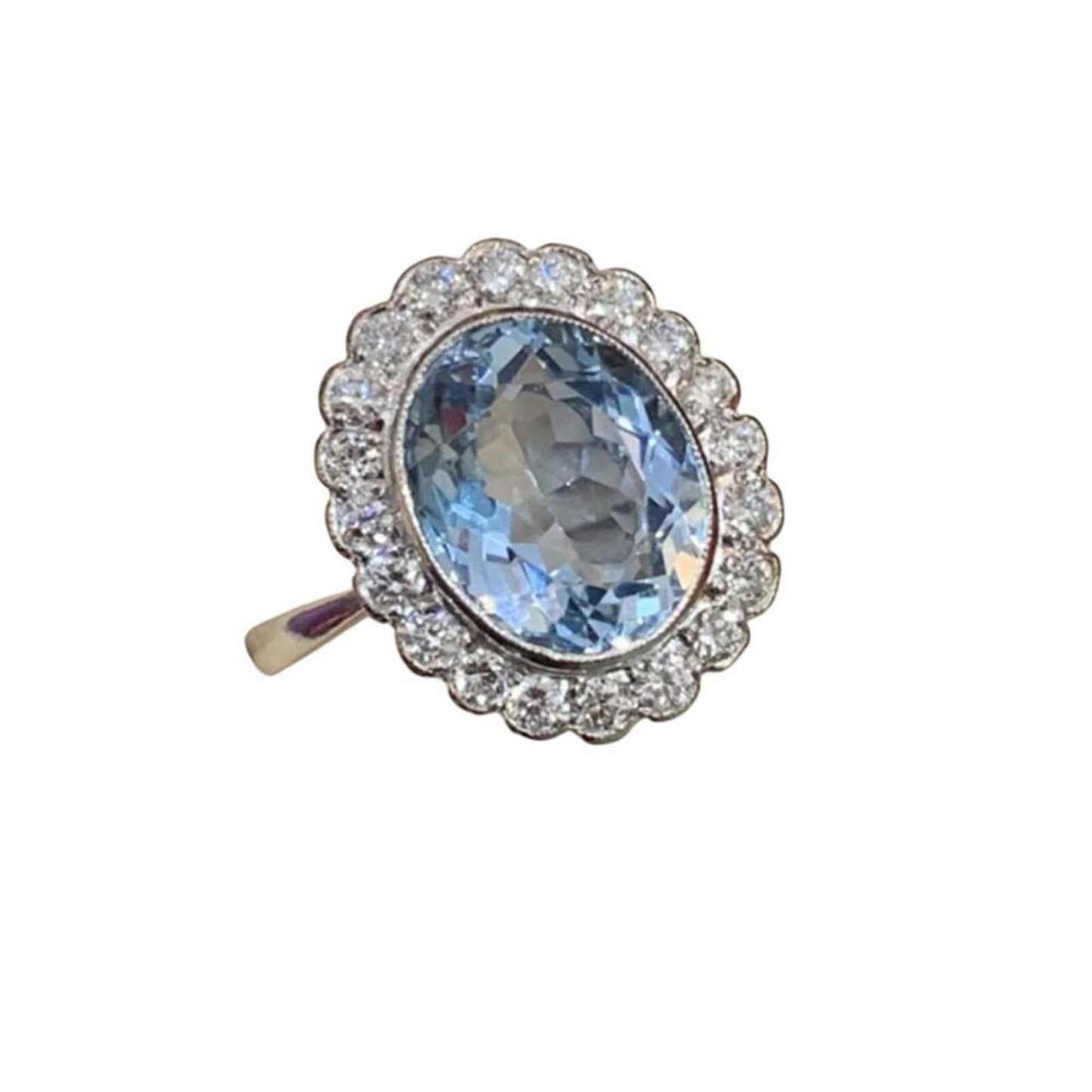 Blue oval ring - gold - CZs - Size 10.