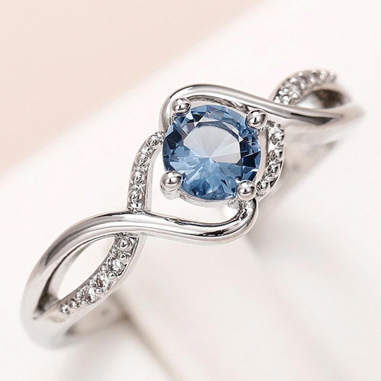 Light blue round twist RING - Silver - CZs - size 6