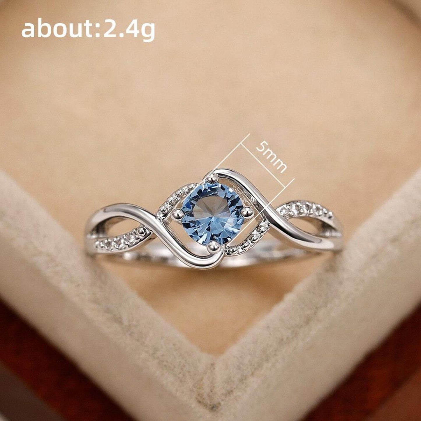 Light blue round twist RING - Silver - CZs - size 6