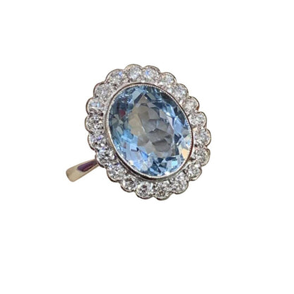 Blue oval ring - gold - CZs - Size 10.